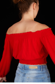 Stacy Cruz casual dressed red off shoulder top upper body…